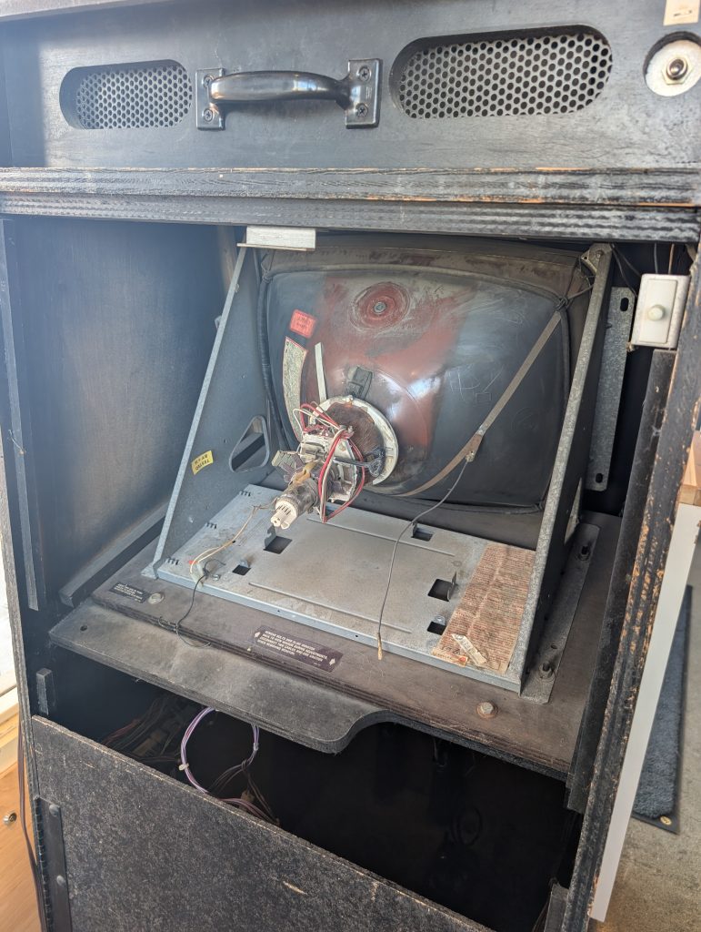 Monitor tilted out in the Joust cabinet